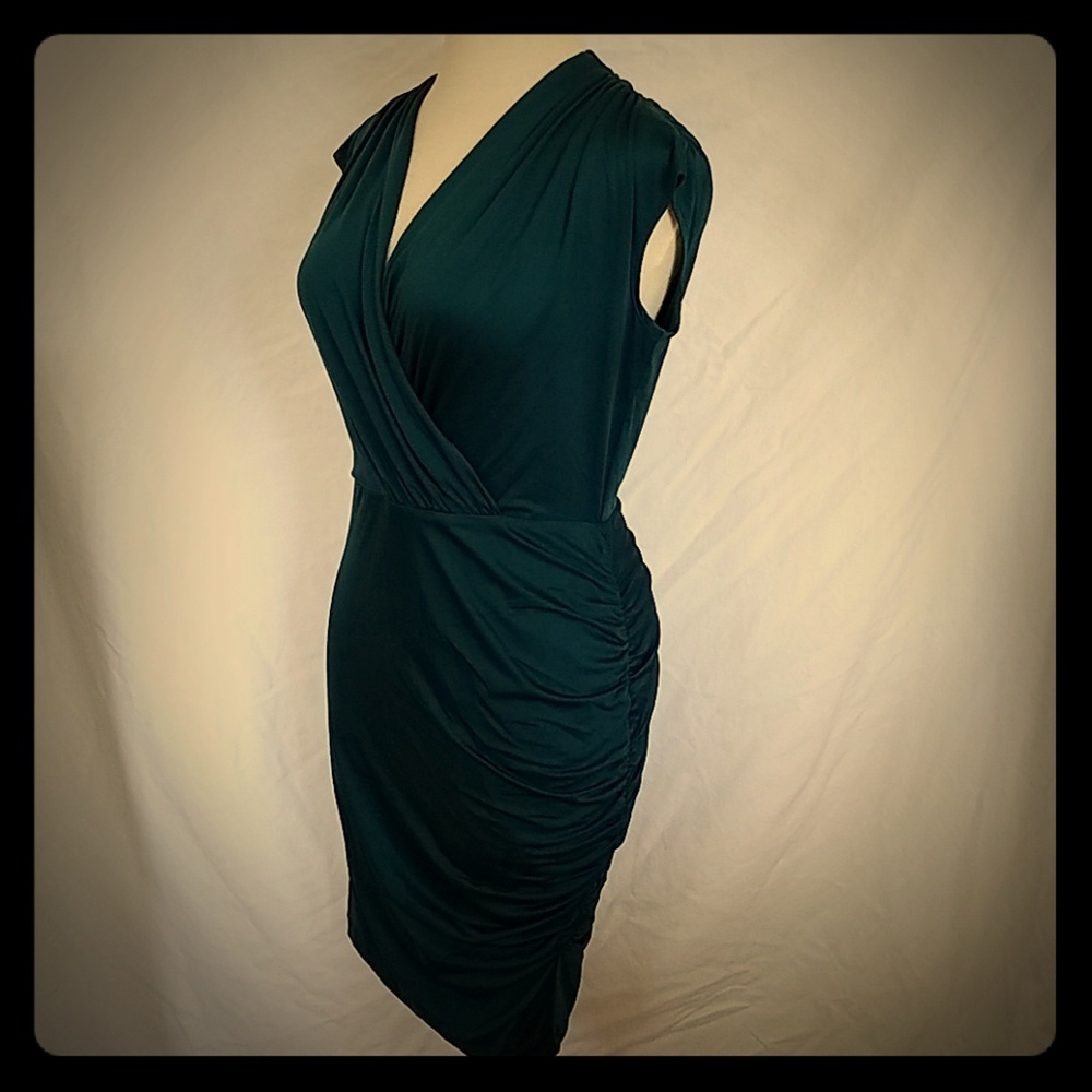 Sea green ruched v- neck cross-over dresss